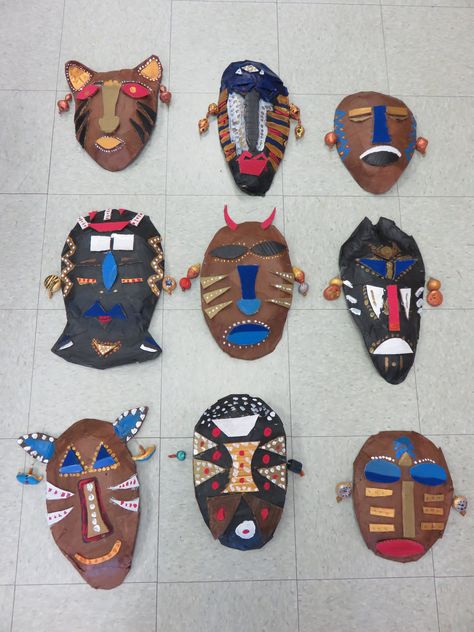 3rd grade paper mache African masks, approx. 10' 14" in length; lesson by art teacher: Susan Joe African Masks For Kids, Egg Carton Art, African Art Projects, Paper Mache Mask, Insect Crafts, Art Kits For Kids, Afrique Art, Diy Costumes Kids, Masks Crafts