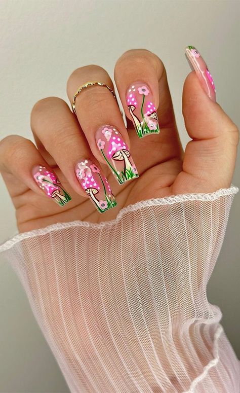 flower nails, flower nail art, flower nails designs, cute flower nails, pink floral nails, short nails flower, daisy nails, ditsy nails, flower and french tip nails Nail Designs With Pink Base, Abstract Flower Nail Art, Sparkle Flower Nails, Flower Garden Nails, Toadstool Nails, Pink Mushroom Nails, Flower Charm Nails, Pink Flower Nail Designs, Crazy Nail Ideas