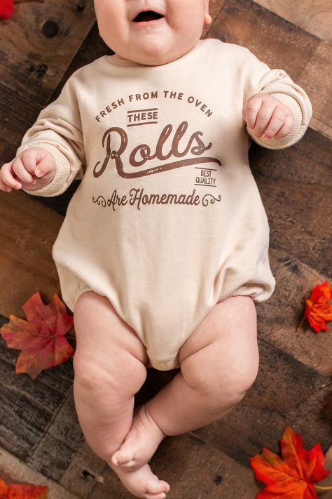 "This baby thanksgiving outfit will get lots of laughs!  Funny graphic is original to this shop :) Listing includes \"These rolls are homemade\" on your choice of piece: -  on natural bodysuit (short or long sleeve).   - sweatshirt romper - tshirt - oatmeal long romper  Sizes  See size chart in listing photos.   Printing  Most of the bodysuits are screenprinted.  The sweatshirt rompers, long rompers are all heatpressed with screenprint transfers.  Tees are screenprinted. ** Timing ** Super fast These Rolls Are Homemade Baby Picture, Homemade Rolls Onesie, Baby Onesies Cricut, Thanksgiving Onesie Ideas, Baby Boy Things, Newborn Outfits Boy, Thanksgiving Baby Shirts Vinyl, Baby Thanksgiving Outfit, Baby Boy Stuff