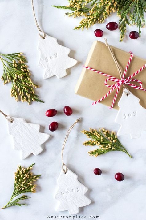 DIY Air Dry Clay Christmas Ornaments. Step by step directions with photos. These charming little tags make the perfect handmade gift! #christmasornament #airdryclay