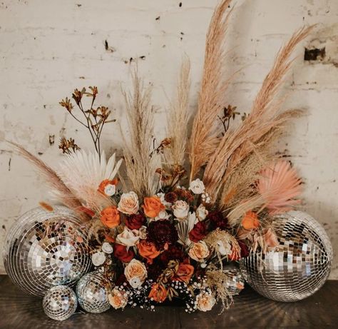 Roller Disco Wedding Inspo Pampas Grass And Disco Balls, Pampas Disco Ball, Disco Ball Arrangement, Mirror Ball Wedding Decor, Rustic Disco Wedding, Fall Disco Wedding, Desert Disco Wedding, Western Disco Wedding, Disco Ball And Flowers