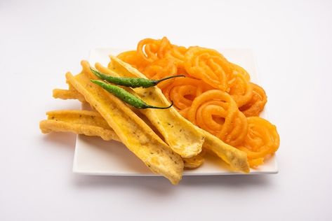 Crispy fafda with sweet jalebi is an ind... | Premium Photo #Freepik #photo #jalebi #indian-snacks #mithai #indian-food Fafda Jalebi Photography, Jalebi Fafda, Fafda Jalebi, 4 Pillars, Garlic Chutney, Hanuman Wallpapers, Ram Image, Gujarati Food, Spicy Peanuts