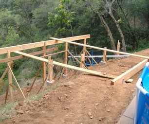 Building a 24' X 20' Deck on Steep Slope Hillside Deck, Deck Footings, Ground Level Deck, Deck Building Plans, Under Deck, Outdoor Living Deck, Laying Decking, Deck Layout, Deck Construction