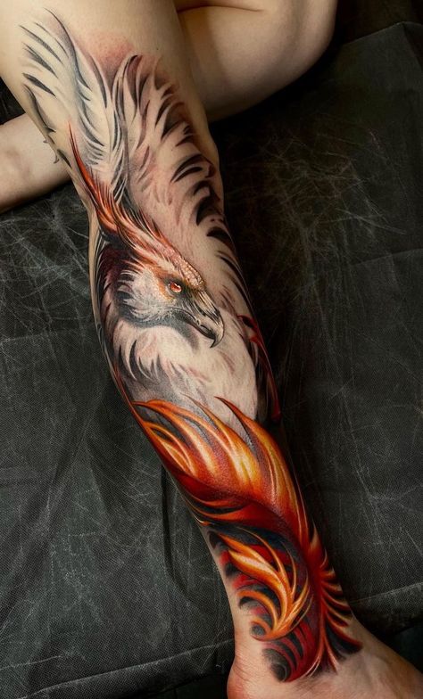 Phoenix Tattoos: Meanings, Tattoo Styles & Ideas Phoenix Bird Back Tattoo, Phoenix Bird Tattoos Men Forearm, Fire Tattoos Men, Phenix Tattoo For Men, Phoenix Tattoo Meaning Woman, Phoenix Realistic Tattoo, Men’s Phoenix Tattoo, Fire Phoenix Art, Masculine Phoenix Tattoo