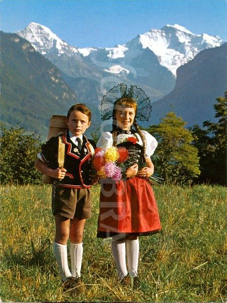 swiss people images | Switzerland, traditional Oberlander dress | Children, Young People Swiss Clothing, Jungfrau Switzerland, Costumes Around The World, World Thinking Day, Oktoberfest Party, National Dress, Folk Dresses, Swiss Alps, Folk Costume