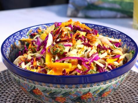 Mango Slaw Recipes, Peanut Ginger Dressing, Best Coleslaw Recipe, Coleslaw Recipes, Mango Slaw, Ramen Noodle Salad, Michael Symon, Asian Slaw, Ginger Dressing