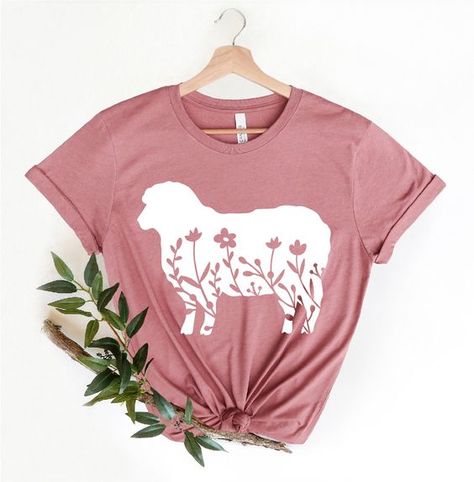 #FarmAnimalTees #ChickenLoversGift #FunnyChickenShirt #BlockPrintedShirt #FloralTShirt #VintageBotanical #CelestialTee #HumorousTees #GraphicTees #NatureInspiredFashion #AnimalLoversApparel #WhimsicalTees #BotanicalFashion #UniqueGraphicShirts #CasualChicTees Cricut Clothing, Farm Tourism, Sheep Silhouette, Farm Shirts, Sweet Shirts, Dream Boutique, Gift For Farmer, Botanical Fashion, Farm Tees