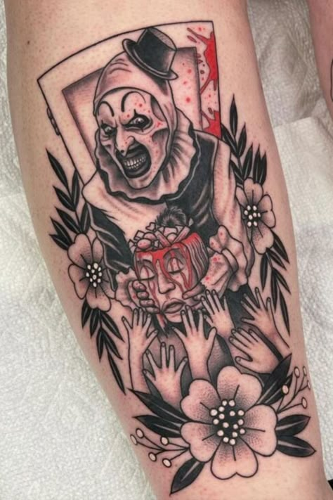 "These Art the Clown tattoo ideas offer a terrifying way to celebrate your love for horror. A bold choice for a small tattoo with iconic appeal." Art The Clown Terrifier Tattoo Design, Slasher Tattoo, Art The Clown Tattoo, Terrifier Tattoo, Clown Tattoo Ideas, American Horror Story Tattoo, Horror Tattoo Ideas, The Terrifier, Horror Sleeve