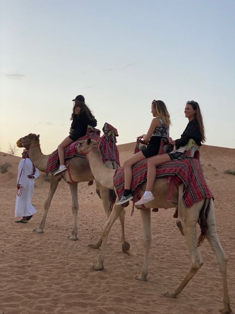 Camels, Dubai, desert, friends, sisters, traveling, vacation, what to do in Dubai, Dubai Aesthetic Camels, Dubai With Friends Aesthetic, Dubai Camel Ride Outfit, Dubai With Friends, Camel Riding Outfit, Dubai Inspo Pics, Friends Adventure Aesthetic, Camel Ride Outfit, Dubai Pics