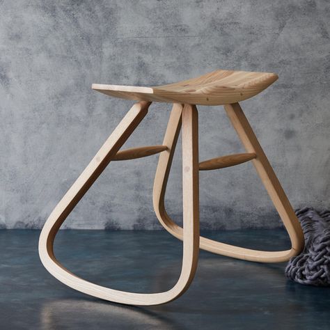 An asymmetric rocking stool, a single length of wood is steamed and bent to create a strong asymmetric rocker for an exceptional ergonomic stool | can be made in Sottish oak or Scottish ash, 50 x 50 x 50 cm #rockingstool #localgreenwood #handsculpted #classicdesign #scottishmadefurniture Rocking Stool Design, Plywood Rocking Chair, Shop Stool With Backrest, Ergonomic Stool, Steel Stool, Leather Industry, Green Wood, Ergonomic Chair, Oak Furniture