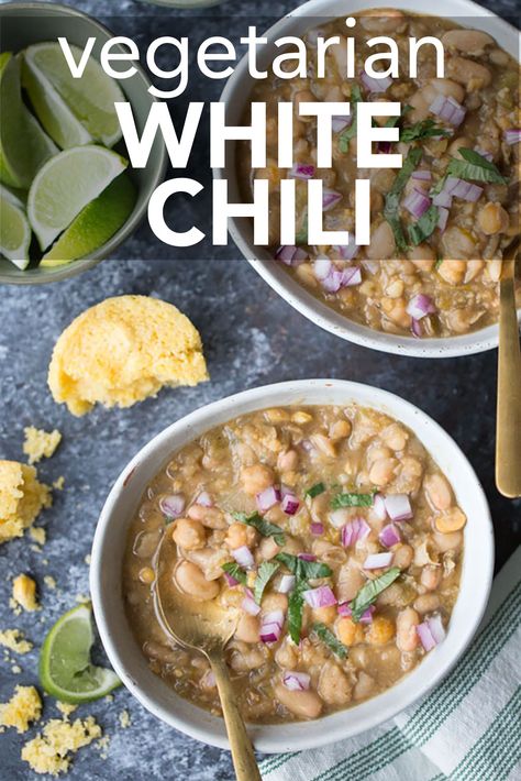 A bowl of vegetarian white chili with lime slices and cornbread. The text reads, "vegetarian white chili." White Chili Recipe Vegetarian, Meatless White Chili, White Bean Sweet Potato Chili, Vegan Chili Recipe Crock Pot, Best Vegan Chili Recipe, White Bean Chili Vegan, Vegetarian White Chili Crockpot, White Bean Chili Crockpot, Vegetarian White Bean Chili Recipe