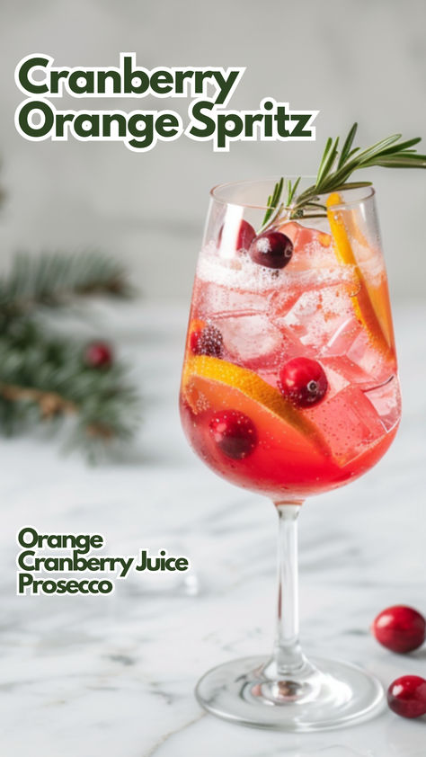 Cranberry Orange Spritz Snow Day Spritz, Cranberry Orange Prosecco Cocktail, Cranberry Orange Spritzer, Dried Orange Cocktail, Thanksgiving Prosecco Drinks, Christmas Cocktails With Prosecco, Spiced Cranberry Cocktail, Thanksgiving Spritzer, Cranberry Prosecco Cocktail