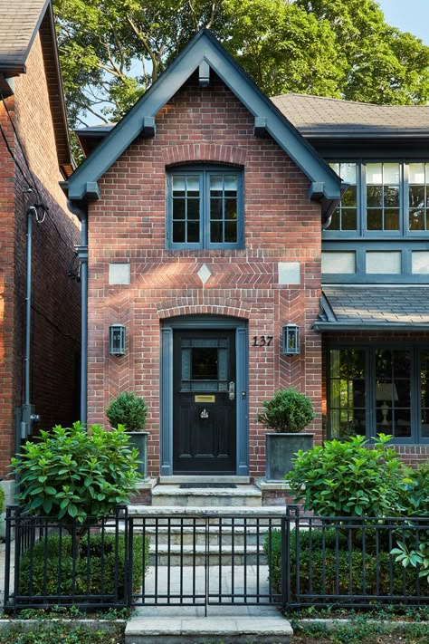 Traditional Brick Homes: Exterior Ideas and Inspiration | Hunker Red Brick House Grey Trim, Yellow Brick House, Brick Paint Colors, Traditional Brick Home, Red Brick House Exterior, Black Exterior Doors, Brick Farmhouse, Manifesting 2024, Black Front Door