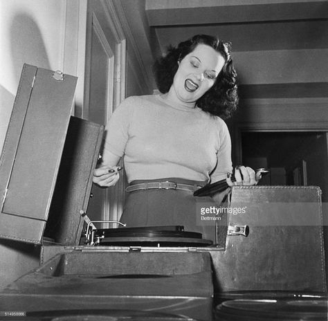 Mobster Bugsy Siegel’s gangster moll girlfriend, Virginia Hill, listening to rhumba records Bugsy Siegel, Virginia Hill, Celebrities Then And Now, Tough Guy, Still Image, Then And Now, Virginia, Getty Images, The Outsiders