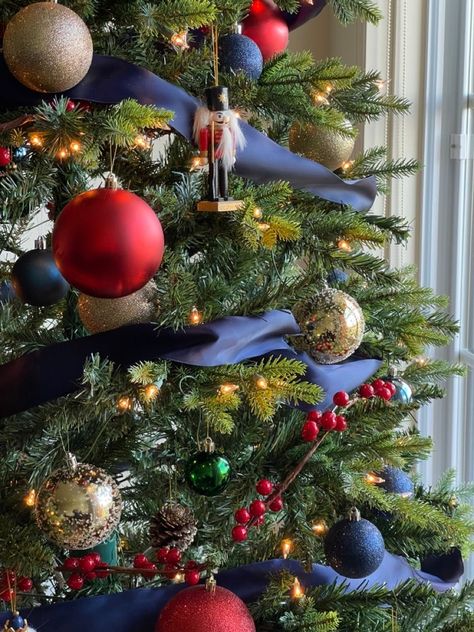 Navy Blue And Red Christmas Tree, Blue Red And Gold Christmas Tree, Christmas Tree Blue And Red, Red Green Blue Christmas Tree, Nutcracker Christmas Tree Ideas, Navy And Red Christmas Decor, Nutcracker Christmas Tree Theme, Red And Blue Christmas Tree, Navy Blue Christmas Decor