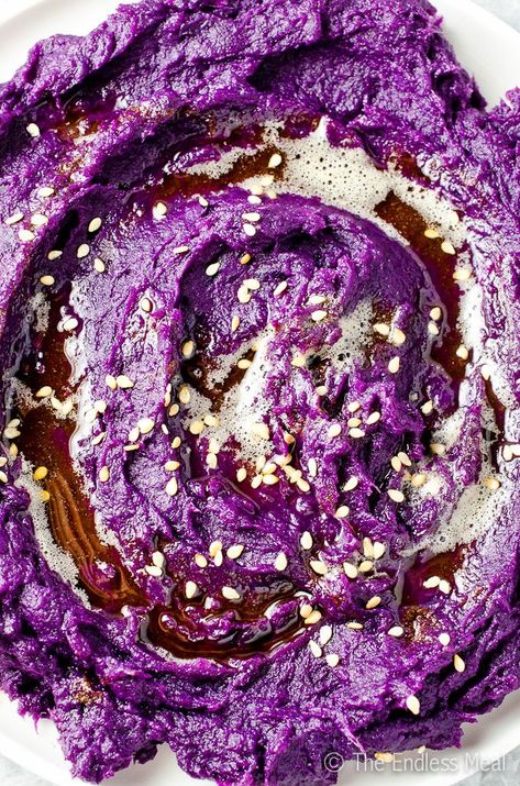 SAVE FOR LATER! These Mashed Purple Yams with Sesame Brown Butter make an extra tasty, pretty, and healthy alternative to regular sweet potatoes. They are a crowd-pleaser both on the table and on the plate. You will love them! #theendlessmeal #sidedish #Thanksgiving #Easter #paleo #vegan #vegetarian #glutenfree #plantbased #purpleyams #yamrecipes #ube #ubeyams #uberecipes #mashedpotatoes Purple Yams, Vegetarian Easter, Ube Recipes, Yams Recipe, Purple Sweet Potato, Purple Food, Purple Yam, Purple Potatoes, Easter Brunch Food