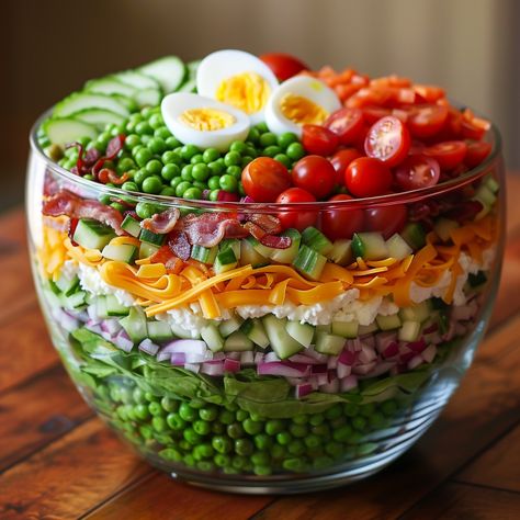 🥗 Elevate your salad game with this vibrant 8 Layer Salad! Crisp, colorful, and oh-so-delicious! 🌈🥬 #LayeredSalad #HealthyEating 8 Layer Salad Ingredients: Iceberg lettuce (1 head, chopped) Cherry tomatoes (1 cup, halved) Cucumbers (1 cup, sliced) Red onion (1/2 cup, sliced) Hard-boiled eggs (4, sliced) Bacon (1/2 cup, cooked and crumbled) Shredded cheese (1 cup) Green peas (1 cup, thawed) Ranch dressing (1 cup) Instructions: In a large glass bowl, layer the ingredients starting with the ... 8 Layer Salad, Rustic Greenhouses, Salad Bowl Recipes, Layer Salad, Agency Office, Large Glass Bowl, Layered Salad, Fine Dining Recipes, Best Salad Recipes