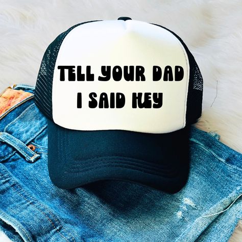 Trucker Hats For Women: Tell Your Dad I Said Hey This Trucker-Style Hat Features A Black Visor And Mesh Back With An Adjustable Snap Closure. The Front Panel Of The Hat Is Solid White And Font Is Black ** Reach Out If You Are Interested In Other Hat Colors Or A Different Font You Like!! Hat Sayings Ideas, Funny Trucker Hats For Women, Trucker Hats For Women, White Trash Party, Funny Trucker Hat, Hat Bar, Cruise Gifts, Fav Products, Women Trucker