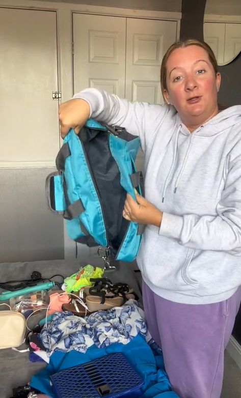 A WOMAN has revealed how she fits four days’ worth of clothes into a small carry-on bag to avoid extra luggage costs when flying with budget airlines. In a video on TikTok, one Ryanair passenger fitted her holiday items into a personal bag that most people would take to the gym. In the 90-second clip, Christina, who is […] No Bag Travel, Ryanair Carry On Packing Tips, Airport Purse, Tiny Gym, Small Carry On Luggage, Hand Luggage Bag, Carry On Packing Tips, Hair Straightener And Curler, Carry On Packing