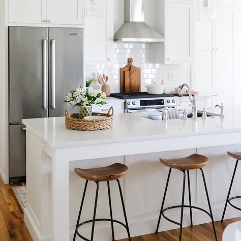 This white kitchen with quartz countertops makes the most of its small footprint with a large island for gathering. West Elm barstools line the island for seating. Click to see more of my home and to follow me for more home decor inspo! #whitekitchencabinets #whitekitchen #whitekitchenideas Best Room Decor, Cozy Fall Living Room, White Kitchen Inspiration, Bar Stools Kitchen, Fall Home Decor Ideas, Fall Mantle, Wood Counter Stools, Fall Living Room, Small Kitchen Decor