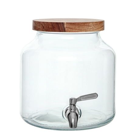 Better Homes & Gardens Clear Glass Beverage Dispenser, with capacity 1.5Gal, in size 8.35inL x 10.24inW x 8.85inH, to be excellent and make your summer more entertaining. Perfect for cold lemonade, water, juices, sangria. Dispenser is constructed of thick, premium grade, durable glass that ensures stability and balance when in use indoors or outdoors. Traditional pot shape make the dispenser vintage and natural feeling. Wood lid in luxury acacia material, with pretty natural wood grain, high valuable. The unique spigot is leak proof, non-drip, simple to use and provides a steady stream of liquid when tightened properly. #304 Stainless steel material is shiny and strong. Serve your favorite drinks indoors or outdoors! From casual picnics and barbecues, to formal dinner parties, this will su Clear Drink Dispenser, Sangria Dispenser, Hot Beverage Dispenser, Glass Water Dispenser, Lemonade Water, Glass Water Jug, Coffee Dispenser, Glass Beverage Dispenser, Coffee Carafe