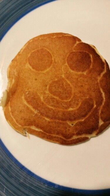 Happy face pancake.   I'm a horrible artist so I went with the the easy happy face. This was easy to do with my squirt bottle. I need to work on the timing but my daughter was happy and that's all that matters. Happy Face, Pancakes