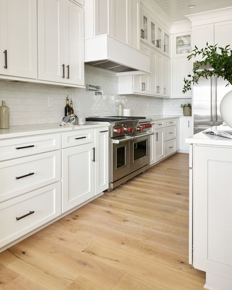 White kitchen cabinets with white tile backsplash. White Kitchen Wood Floors, Hardwood Floor Colors, Wood Floor Kitchen, Light Hardwood, Light Hardwood Floors, Shaw Floors, Kitchen Floor Tile, Engineered Hardwood Flooring, White Kitchen Cabinets