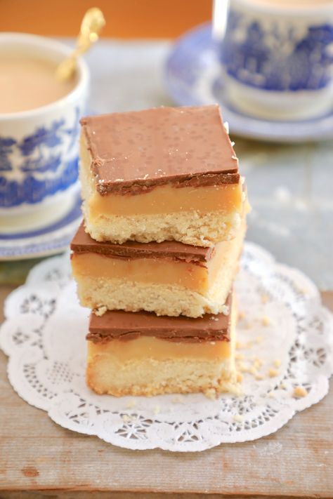 A dessert so rich it's called Millionaire's Shortbread! Also known as Caramel Squares, this dessert has layers of shortbread, caramel, and chocolate. Caramel Squares Recipe, Millionaire Shortbread Recipe, Gemma Stafford, Tart Pastry, Caramel Squares, Millionaire's Shortbread, Truffle Recipes, Caramel Shortbread, Bigger Bolder Baking