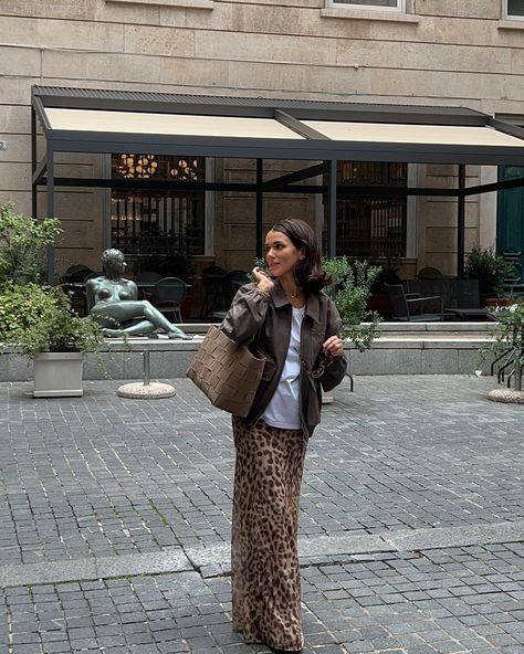 Fall in Italia is for leopard maxi skirt and suede bomber jacket 🤎 #falloutfit #fashioninspo #ootdshare #ootdfashion #autumnstyle #autumnstyles #italianstyle #frenchgirlstyle Maxi skirt, leopard print, suede jacket, bomber jacket, fall, fall outfit Outfit With Leopard Skirt, Leopard Skirt Outfit Fall, Leopard Maxi Skirt Outfit, Leopard Maxi Skirt, Leopard Skirt Outfit, Leopard Print Maxi Skirt, Leopard Maxi Skirts, Skirt Outfit Fall, Wardrobe Goals