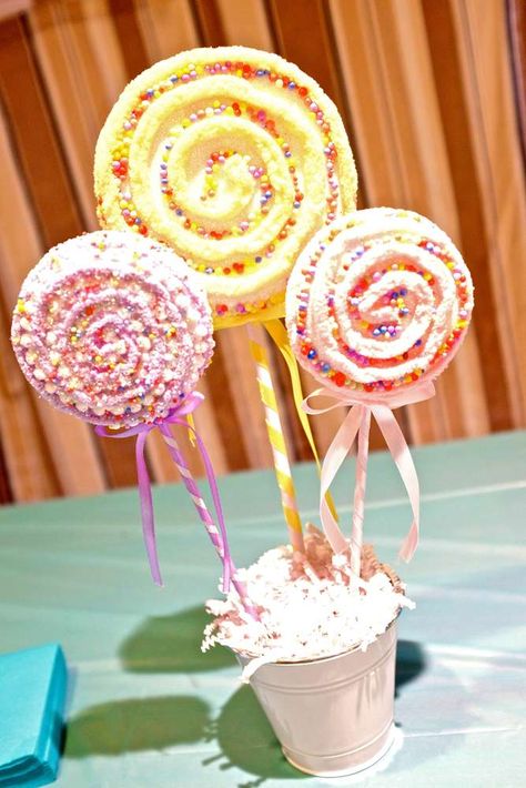 Katy Perry Party!! | CatchMyParty.com Candyland Display, Lollipop Decor, Lollipop Centerpiece, Fake Lollipop, Candy Centerpiece, Large Lollipops, Candy Decor, Candy Lollipops, Candy Christmas Tree