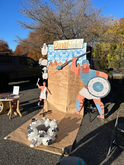 David And Goliath Trunk Or Treat Ideas, Armor Of God Trunk Or Treat Ideas, David And Goliath Vbs Decorations, Biblical Themed Trunk Or Treat Ideas, David And Goliath Trunk Or Treat, David And Goliath Decorations, Church Festival Games, Moses Red Sea, Church Trunk