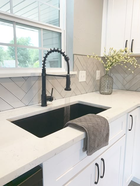 Black Sink And Black Faucet, Black Farmers Sink, Matte Black Farmhouse Sink, White Sink Black Countertops, Farmhouse Kitchen Black Sink, Black Home Hardware, White And Black House Interior Design Kitchen, Black Farmhouse Sink White Cabinets, Farmhouse Sink With Quartz Countertops