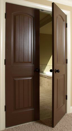 Dark stained interior wood doors including french doors leading into the dining room and formal living room. Wood Door Paint Ideas, Dark Brown Interior Doors, Dark Brown Doors Interior, Brown Doors Interior, Dark Brown Door, Brown Interior Doors, Door Color Ideas, Rustic Entry Doors, Interior Glazed Doors