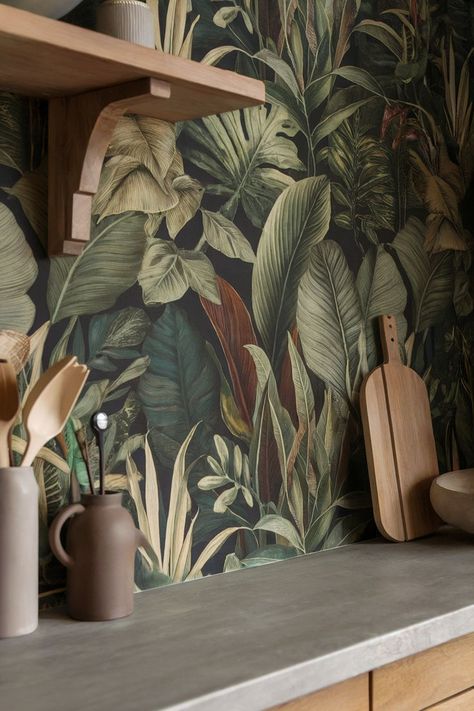 Jungle kitchen wallpaper featuring lush green leaves and plants adds a tropical, nature-inspired feel to the space. Kitchens With Wallpaper, Jungle Kitchen, Kitchen Wallpaper Design, Kitchen Wallpaper Ideas, With Wallpaper, Kitchen Wallpaper, Save For Later, Wallpaper Designs, Add Personality