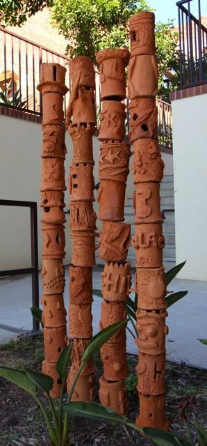 ceramic-totem-poles Outdoor Clay Projects, Clay Totems, Ceramic Totems, Ceramics Projects High School, Pottery Totem Poles Ideas, Clay Totem Poles Ideas, Clay Totem Poles, Ceramic Totem Poles Garden Art, Totem Ceramic Ideas