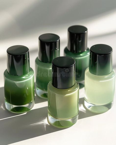 A collection of nail polish bottles, showing a gradient from light green to dark green, reflecting the fresh stock photography Nail Polish Bottle Design, Nail Polish Bottle, Elements And Principles, Nail Polish Bottles, Bottle Design, Light Green, Stock Photography, Dark Green, Nail Polish