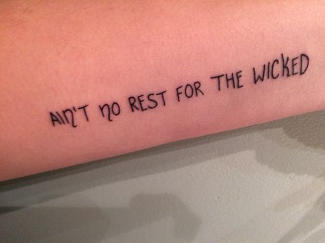 Ain't no rest for the wicked tattoo It Is What It Is Til It Aint Tattoo, No Rest For The Wicked Tattoo, Wicked Tattoo Ideas, Script Tattoos, Horse Tattoos, Faith Tattoo On Wrist, No Rest For The Wicked, Dragon Tattoo Back Piece, Good Tattoo Quotes