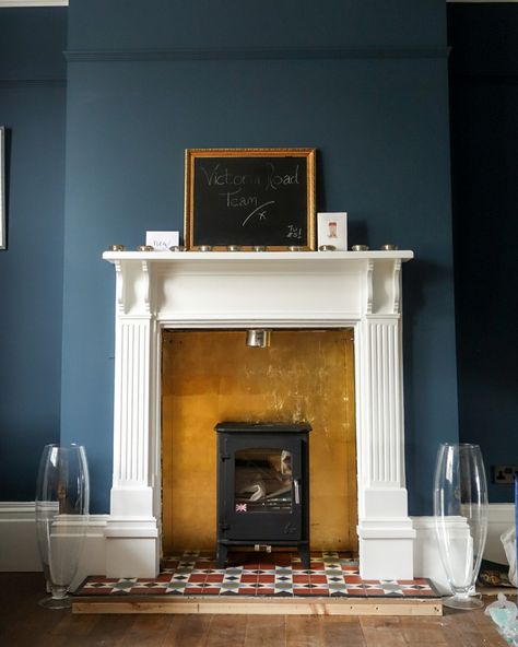 @victoria_road_restoration on Instagram: “The gold leafed toughened glass has been fitted behind the fireplace and I’m pretty happy with the result. Considering the gold tiles I…” Gold Leaf Fireplace Surround, Gold Leaf Fireplace, Gold Fireplace, Victorian Flat, Gold Tiles, Simple Fireplace, Gold Tile, Fire Surround, Log Burner