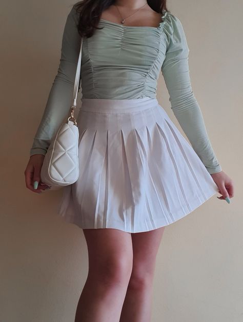 White pleated skirt | Baby green aesthetic | Cute outfit for spring Baby Green Aesthetic, Pink Pleated Skirt Outfit, Green Aesthetic Cute, Pleated Skirt Outfit Short, Pleated Skirt Outfits, Girl Aesthetic Outfits, Low Cut Shirt, White Chiffon Blouse, Outfit For Spring