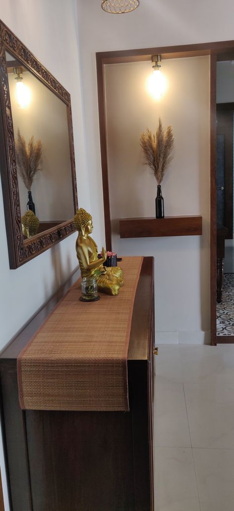 Entry way decor with Gautam Buddha and traditionally designed mirror House Entrance Ideas Indian, Indian Entryway Decor, Entryway Decor Apartment, Entryway Decor Indian, Entry Way Decor, Gautam Buddha, Apartment Style, Indian Decor, Entry Way