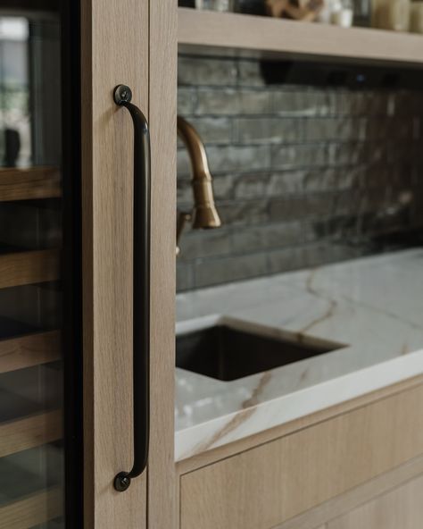 Rift White Oak has been a staple in our design for the past five years. It can lend itself to both modern and traditional aesthetics ✨ #thedendesign_bellbeauty Design by @thedendesigngroup Builder @urbanpachomes Photos @jessicafixphotography #thedendesigngroup #siliconvalleyinteriordesign #losaltoshillshome #whiteoakcabinetry #transitionalkitchen #wetbardesign #myonepiece White Cabinet Wet Bar, White Oak Wet Bar, Tall Wine Fridge, Modern Wet Bar, Slab Kitchen Cabinets, White Oak Kitchen Cabinets, Wet Bar Designs, Backsplash White, Den Design