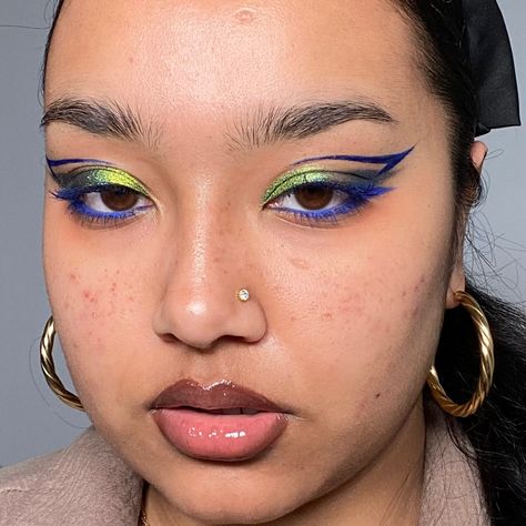 Graphic Liner Eyeshadow, Coloured Liner Looks, Blue And Green Graphic Liner, Metallic Graphic Liner, Graphic Liner Purple, Hooded Eye Graphic Eyeliner, Hozier Concert Makeup, Colorful Under Eye Makeup, Graphic Liner Hooded Eyes