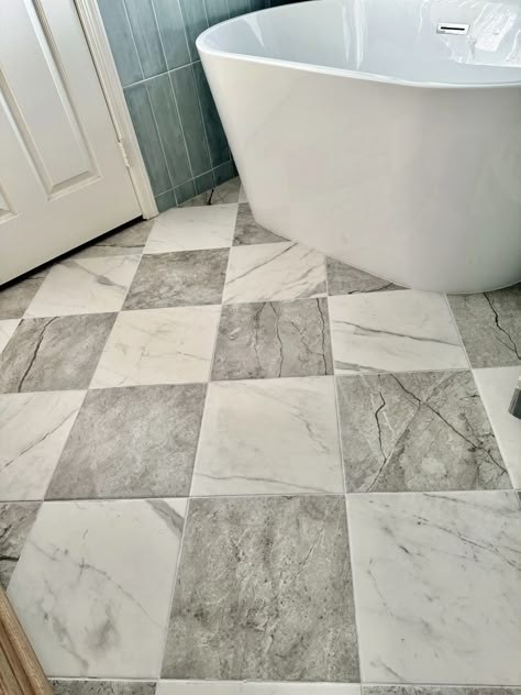 We found the Perfect Checkerboard Floor Tile – and it’s affordable! | guitar & lace Bathroom Floor Tile And Shower Tile, Wallpaper With Checkerboard Floor, Checkerboard Linoleum Floor, Harlequin Floors Bathroom, Black White Entryway Tile, Checkerboard Floor Mudroom, Grey And White Checkered Tile Floor, Dark Floor In Bathroom, Grey Bathroom Flooring