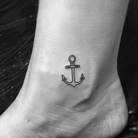 Discover the elegance of simplicity with this charming anchor tattoo, a symbol of stability and grounding. Let it inspire your next ink choice. Save & follow for more minimalist tattoo inspiration. Nestled on the inside of an ankle, its crisp lines and understated design speak volumes about finding balance in life's turbulent seas. #MinimalistTattoo #AnchorInk #InkInspiration #StayGrounded #AnkleTattoo #TattooArt #FollowForMore #SaveThis # Minimal Anchor Tattoo, One Line Anchor Tattoo, Fine Line Anchor Tattoo, Anchor Tattoo On Ankle, Anchor Tattoos For Women, Tattoo On Ankle, Tattoo Anchor, Anker Tattoo, Anchor Tattoos