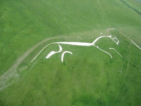 Must see the white horse of Uffington, a Bronze Age horse carved into the chalk hills in Oxfordshire, England. Tiffany Aching, Ancient Landscape, Travel Quiz, Oxfordshire England, South West Coast Path, Standing Stones, Pagan Rituals, Genius Loci, Travel Facts