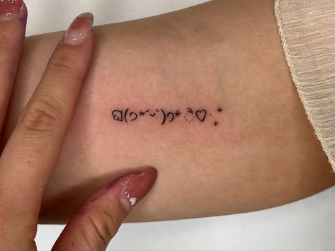 Emoji tattoo 
Tattoo
Emoji
Fineline tattoo Mini Tattoos Words, Emoticon Tattoo, Mochi Tattoo, Kaomoji Tattoo, Tattooing Aesthetic, Ascii Tattoo, Back To Middle School, Emoji Tattoo, Tattoo Cute