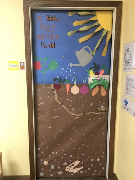 Veggie garden, classroom door, soil layers, veggie decoration, gardening decoration Garden Door Decorations Classroom, Garden Display Classroom, Farmers Market Classroom Door, Garden Classroom Door, Garden Theme Classroom Door, Garden Classroom Ideas, Earth Day Classroom Door, Plant Themed Classroom Door, Earth Day Door Decorations Classroom