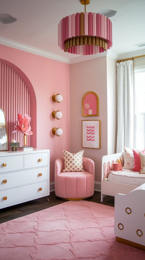 eclectic girls' room with elegant decor. modern pink wall. beautiful chandelier. pink cushion chair and rug, large vanity table. modern wall art posters. Toddler Girl Pink Bedroom, Barbie Themed Room, Girly Playroom, Pink Toddler Rooms, Pink Kids Bedrooms, Pink Girls Room, Room Ideas For Girls, Eclectic Kids Room, Kids Room Ideas