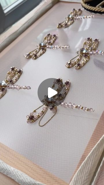 Embroidery Designer on Instagram: "3D Hand Embroidered Dragonflies for @felisitigreis ⁣💕✨ ⁣ #tambourbeading #beading #beadembroidery #luneville #beadwork #dragonfly #embroideryvideo #wedding #bespoke #weddingdress #seedbeads #sequins #embroiderydesign #coutureembroidery #craft  #embroiderydesigner #tambourembroidery #embellishment #crystalbeads #satisfying #theadwork #handmadeuk #madeinlondon #asmr #stitch #sewing #rhinestones #crystals #couture" Cristal Embroidery, 3d Bead Embroidery, Metal Sequin Embroidery, Beaded Embroidery Butterfly, Embroidered Dragonflies, Sewing Rhinestones, Beaded Dragonflies, Luneville Embroidery Tambour Beading, 3d Sequin Flower Embroidery