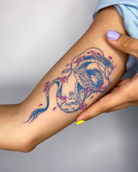 Taylan Ulukır on Instagram: “Cute blue dragon with purple flowers for Elif.. It was nice meeting you guys, thank you! 💙🐉💜🐉 . . . . #tattoodesign #snaketattoo…” Purple Dragon Tattoo For Women, Blue Ink Dragon Tattoo, Blue Dragon Tattoo For Women, Purple And Blue Tattoo, Blue And Red Tattoo, Colored Tattoos For Women, Red And Blue Tattoo, Dragon Art Tattoo, Purple Dragon Tattoo